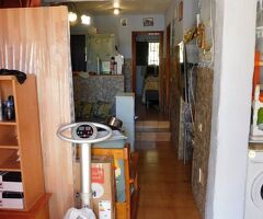 Kleiner renovierungsbedürftiger Reihenbungalow mit Gemeinschaftspool